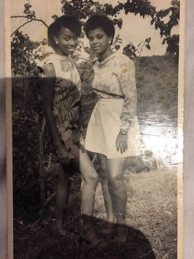 With a dear friend in her teenage years.