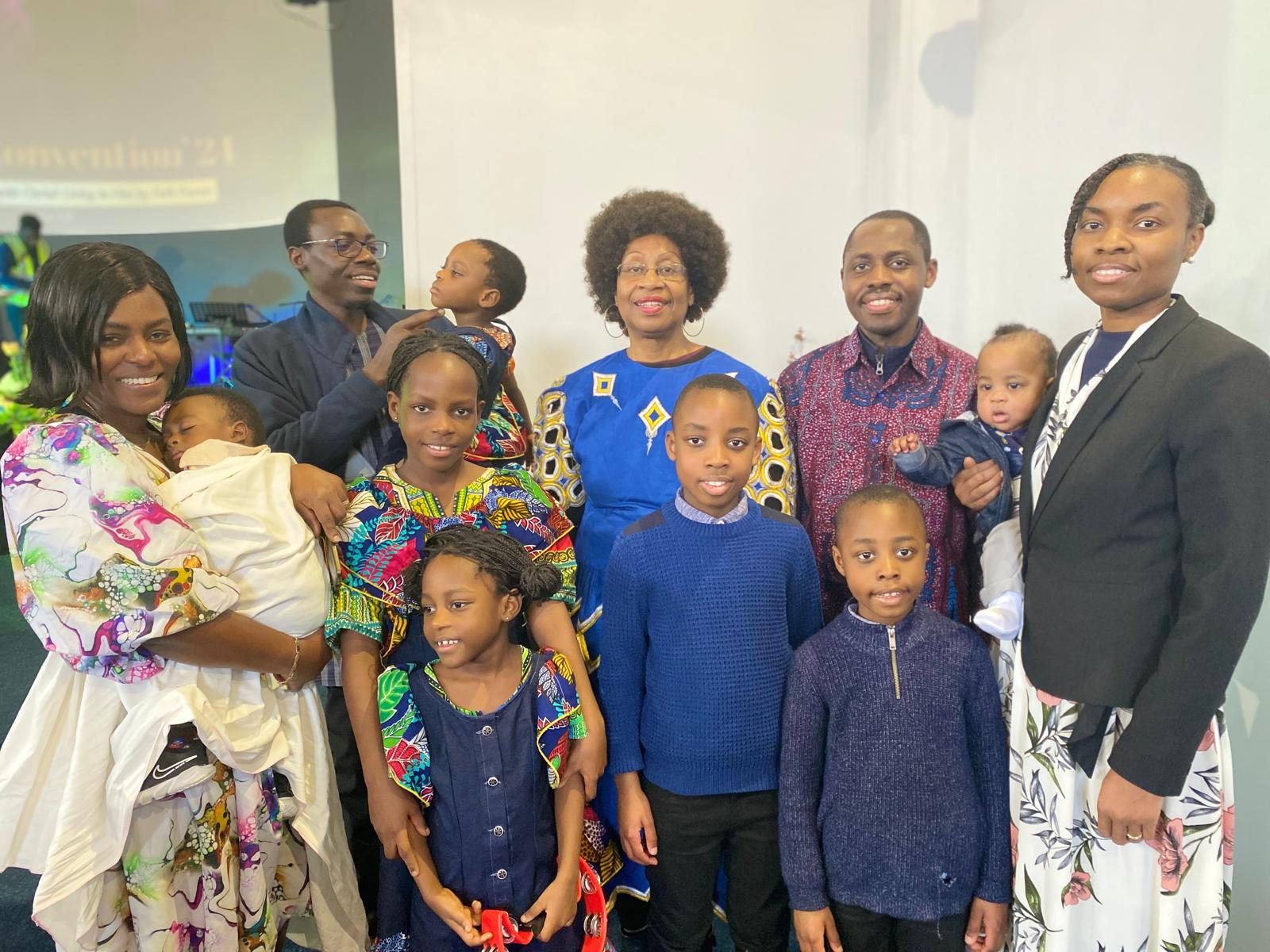 Surrounded by the extended family.